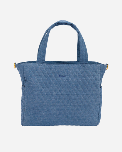 Denim quilted handbag with a visible brand logo on a white background