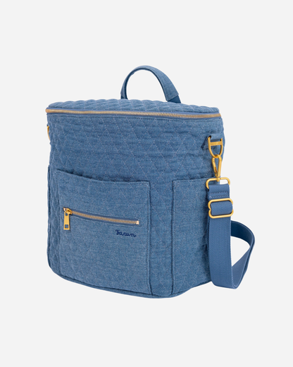 Blue backpack with gold zippers on a white background